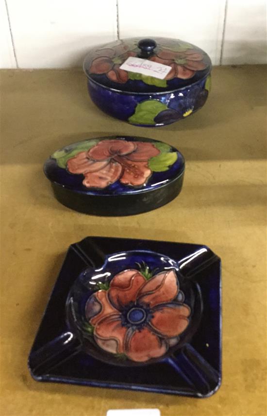 Moorcroft circular powder bowl , cover and a similar smaller oval box and cover (damaged)